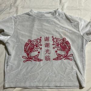 A velvet crushed crop top with red koi fish